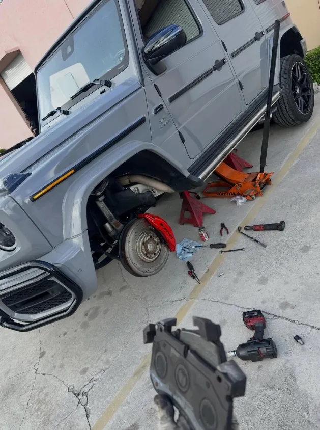 Mercedes-Benz brake service with wheel removed and brake rotor exposed